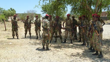 A picture taken on March 2, 2012 shows Ethiopian soldiers receiving a briefing before displaying of weapons left behind by Shebab militias at their former base in Baido, which was taken over from Shebab rebels on February 22. Truckloads of Ethiopian and Somali troops on February 22 captured the strategic Somali city of Baidoa from Al-Qaeda-allied Shebab insurgents, who vowed to avenge their biggest loss in several months. Baidoa, 250 kilometres (155 miles) northwest of the capital Mogadishu, was the seat of Somalia's transitional parliament until the hardline Shebab captured it in 2009. Ethiopia says it is in the country to support Somalia’s transitional government to stamp out Shebab insurgents, but says it does not plan to remain in the country for the long term. AFP PHOTO / JENNY VAUGHAN