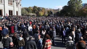 People attend an opposition rally to demand the resignation of Armenian Prime Minister Nikol Pashinyan following the signing of a deal to end the military conflict over the Nagorno-Karabakh region, in Yerevan, Armenia, on November 11, 2020. (Reuters)