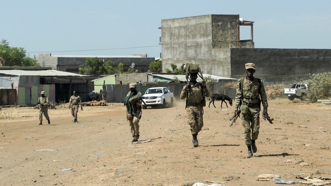 Members of the Amhara Special Force return to the Dansha Mechanized 5th division Military base after fighting against the Tigray People's Liberation Front (TPLF), in Danasha, Amhara region near a border with Tigray, Ethiopia, on November 9, 2020. (Reuters)