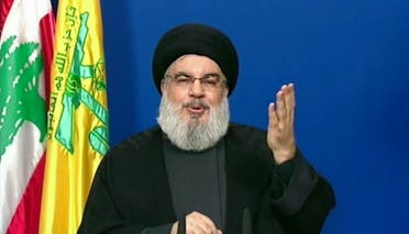 Hassan Nasrallah, chief of the Shia Muslim movement Hezbollah, delivering a televised speech from an undisclosed location in Lebanon. (AFP)