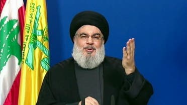 Hassan Nasrallah, chief of the Shia Muslim movement Hezbollah, delivering a televised speech from an undisclosed location in Lebanon. (AFP)