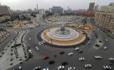 حركة مرور السيارات في ميدان التحرير بوسط العاصمة المصرية - (أ ف ب)