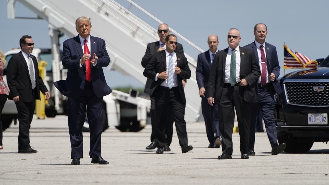 US President Donald Trump is followed by his U.S. Secret Service detail. (Reuters)