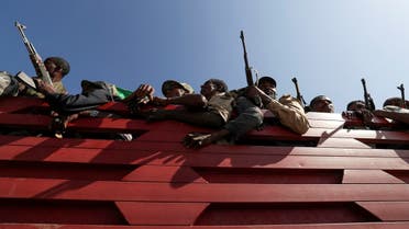 Members of Amhara region militias ride on their truck as they head to the mission to face the Tigray People's Liberation Front (TPLF), in Sanja, Amhara region near a border with Tigray, Ethiopia November 9, 2020. (Reuters)