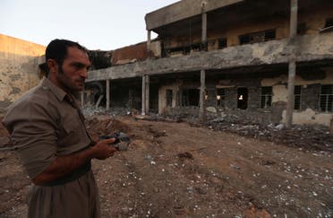 أضرار لحقت بمقر إحدى الجماعات الإيرانية الكردية المعارضة إثر قصف إيراني لمواقع في كردستان العراق في 2018 (أرشيفية)
