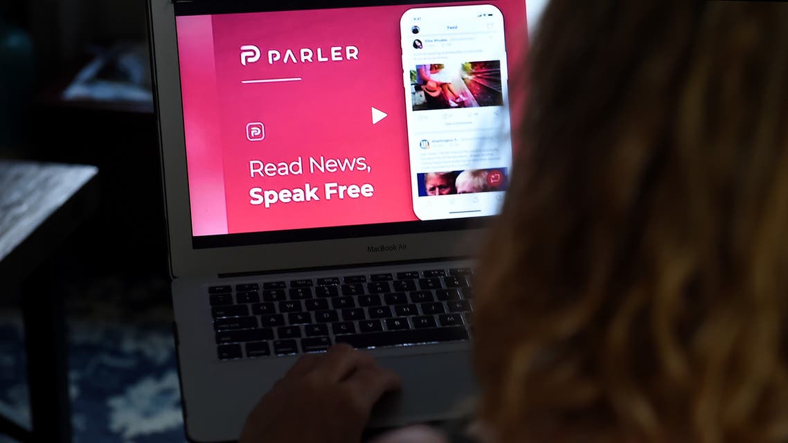 (FILES) This file illustration picture shows the social media website from Parler displayed on a computer screen in Arlington, Virginia on July 2, 2020. Conservatives backing President Donald Trump's claims of election malfeasance have sparked a migration to alternative social media sites which have refrained from filtering unverified claims. The shift has boosted right-wing favorites like Parler, Newsmax and Rumble which have rejected the approach of Facebook and Twitter in labeling and limiting the reach of conspiracy theories.