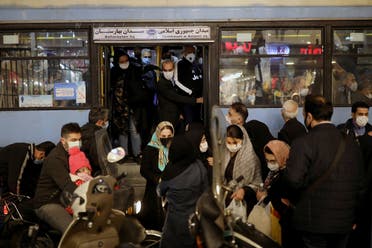 Iranians wearing protective masks are pictured at a bus, amid the outbreak of the coronavirus disease in Tehran, Iran November 11, 2020. (Reuters)