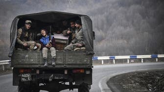 Azerbaijan delays takeover of territory ceded by Armenia, denounces fleeing Armenians