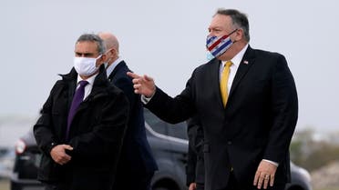 U.S. Secretary of State Mike Pompeo (R) prepares to board a plane at Paris Le Bourget Airport in Le Bourget, on November 16, 2020. Pompeo is en route to Istanbul.