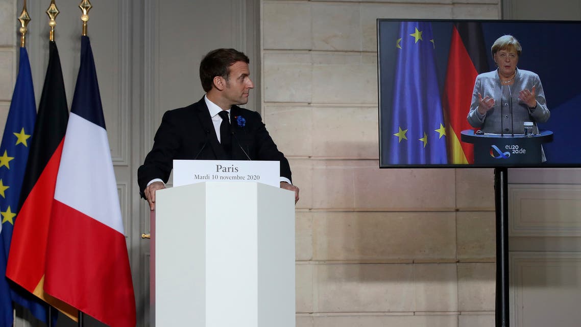 German Chancellor Angela Merkel listens to French president Emmanuel Macron, Nov. 10, 2020. (AP)