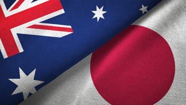 Japan and Australia two flags together realations textile cloth fabric texture stock photo