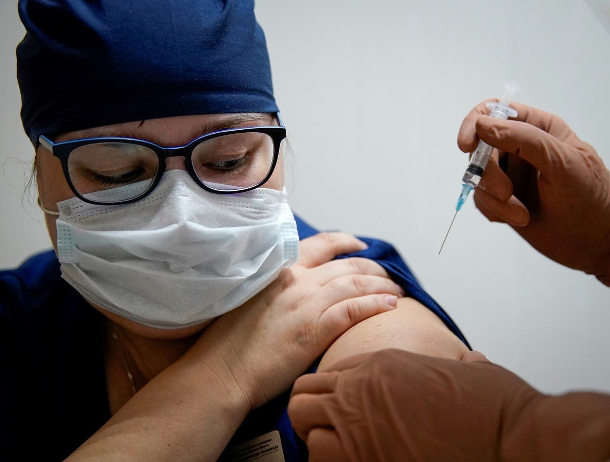  A medic of the regional hospital receives Russia’s “Sputnik V” vaccine shot against the coronavirus disease in Tver, Russia. (Reuters)
