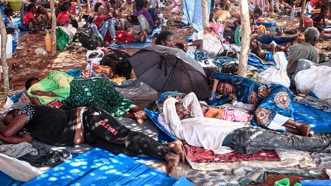 Ethiopian refugees who fled fighting in Tigray province lay in a hut at the Um Rakuba camp in Sudan's eastern Gedaref province, on November 16, 2020. (Ebrahim Hamid/AFP)