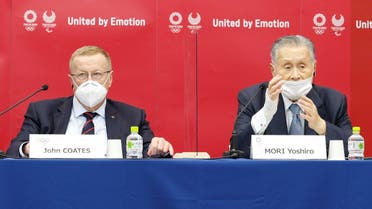 John Coates, Chairman of the Coordination Commission for the Games of the XXXII Olympiad Tokyo 2020, and President of Tokyo 2020 Yoshiro Mori attend a joint press conference at Harumi Island Triton Square Tower Y in Tokyo, Japan November 18, 2020. (Rodrigo Reyes Marin/Pool via Reuters)