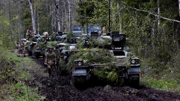 British army armoured vehicles Warrior are seen during a break at the Spring Storm military drill near Sillamae, Estonia May 7, 2019. REUTERS/Ints Kalnins