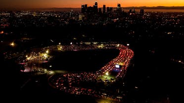 Motorists wait in long lines to take a coronavirus test in a parking lot at Dodger Stadium, Nov 18, 2020, in Los Angeles. (AP)