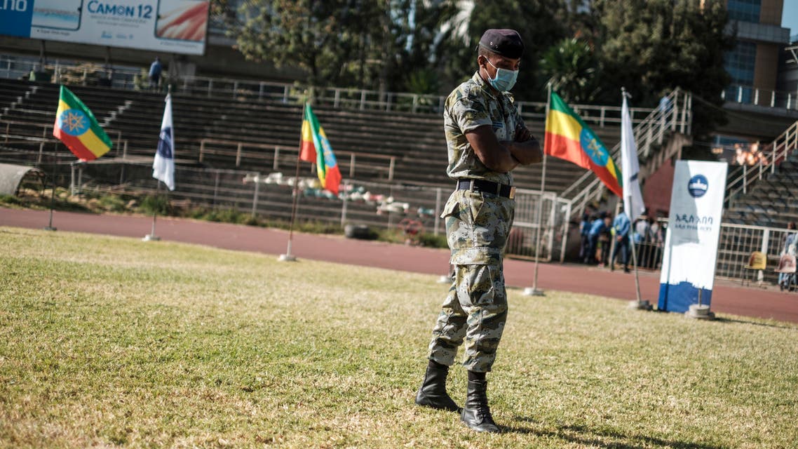 A member of the Special Forces of the Addis Ababa police looks on during a blood donation rally organised by the city administration of Addis Ababa, in Addis Ababa, on November 12, 2020. Hundreds of Ethiopians gathered in the capital on November 12, 2020, to donate blood for troops fighting in the northern Tigray region, as officials tried to rally support for a conflict Prime Minister Abiy Ahmed said was going his way.