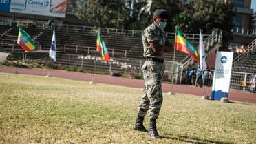 A member of the Special Forces of the Addis Ababa police looks on during a blood donation rally organised by the city administration of Addis Ababa, in Addis Ababa, on November 12, 2020. Hundreds of Ethiopians gathered in the capital on November 12, 2020, to donate blood for troops fighting in the northern Tigray region, as officials tried to rally support for a conflict Prime Minister Abiy Ahmed said was going his way.