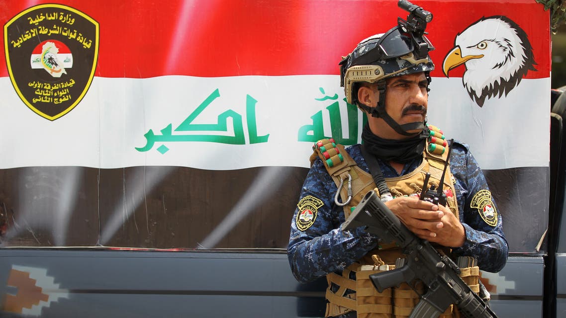 (AFP) A member of the Iraqi federal police forces stands guard at a checkpoint in Baghdad's Karada district on May 20, 2019. A Katyusha rocket crashed the previous day into Baghdad's Green Zone which houses government offices and embassies including the US mission, Iraqi security services said in a statement. The rocket -- which came after Washington ordered the evacuation of non-essential diplomatic staff from the Baghdad embassy and the Arbil consulate citing threats from Iranian-backed Iraqi armed groups -- caused no casualties, it said.