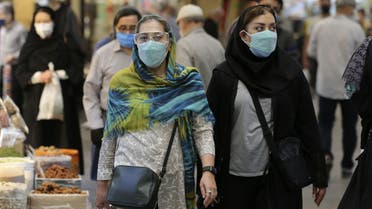 Mask-clad Iranians shop at the Tajrish Bazaar market in the capital Tehran, on November 1, 2020, amid the novel coronavirus pandemic crisis. Iran yesterday announced the expansion beyond Tehran of measures against Covid-19, amid growing calls for a full lockdown after the country posted a string of record highs in deaths and infections.