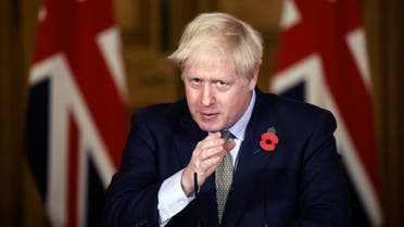 Britain's Prime Minister Boris Johnson speaks during a virtual press conference on the coronavirus pandemic in the UK inside 10 Downing Street in central London on November 9, 2020.  (AFP)