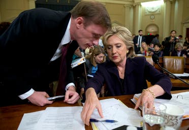 Former Secretary of State Hillary Clinton talks with Jake Sullivan, a former staff member for her at the State Department, before the House Select Committee on Benghazi, Oct. 22, 2015. (AP)