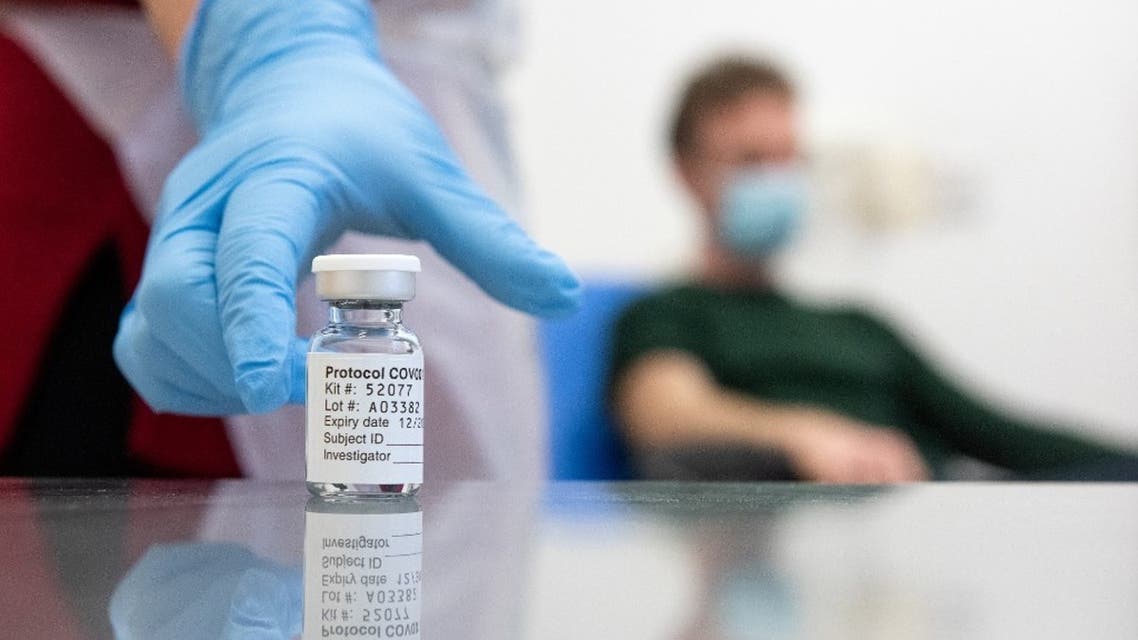 An undated handout picture released by the University of Oxford on November 23, 2020 shows a vial of the University's COVID-19 candidate vaccine. (AFP)