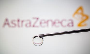  AstraZeneca's logo is reflected in a drop on a syringe needle in this illustration taken November 9, 2020. (Reuters)