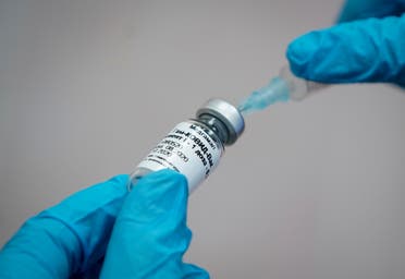 A nurse prepares Russia's Sputnik-V vaccine against the coronavirus disease (COVID-19) for inoculation in a post-registration trials stage at a clinic in Moscow, Russia. (Reuters)