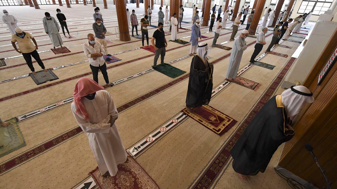 Worshippers keeping a safe distance from one another perform prayers at a mosque in the emirate of Sharjah after the United Arab Emirates reopened places of worship following months of closure to avoid the spread of the Covid-19 coronavirus, on July 1, 2020. The UAE has recorded nearly 45,000 cases of coronavirus, including 302 deaths.