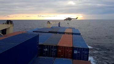 A screen grab made from a video released by Demiroren News Agency shows a German soldier landing from a helicopter on a Turkish cargo ship on November 23, 2020 at east Mediterranean sea. (Demiroren News Agency (DHA)/AFP)