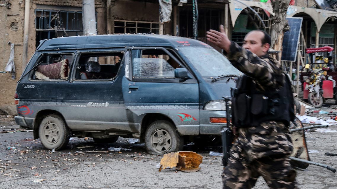 Afghan security personnel arrive at a site after two blasts ripped through in the city of Bamiyan on November 24, 2020. At least 14 people were killed in central Afghanistan on November 24 when two blasts ripped through the historic city of Bamiyan, home to many members of the mainly Shiite Hazara ethnic minority, officials said.