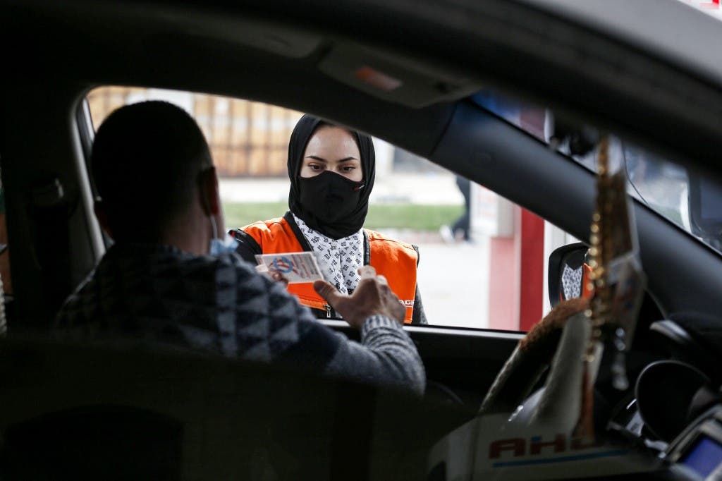 Salma al-Najjar, a 15-year-old Palestinian who works at a petrol station to help her family in Gaza Strip, 24 November 2020.