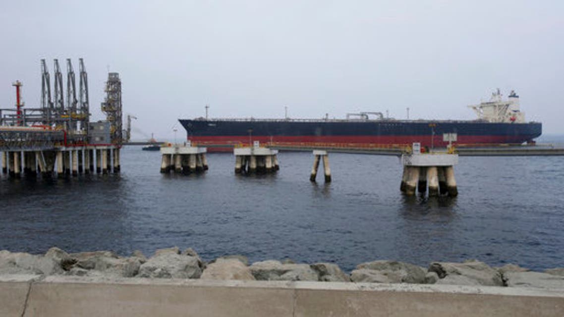 In this Sept. 21, 2016, file photo, an oil tanker approaches the new Jetty during the launch of a $650 million oil facility in Fujairah, United Arab Emirates. The state-run Abu Dhabi National Oil Co. will put a minority stake in its gas station subsidiary up on the local stock market. The company made the announcement on Monday, Nov. 13, 2017, saying 10 percent of ADNOC Distribution will go onto the Abu Dhabi Securities Exchange pending regulatory approval. (AP Photo/Kamran Jebreili, File)