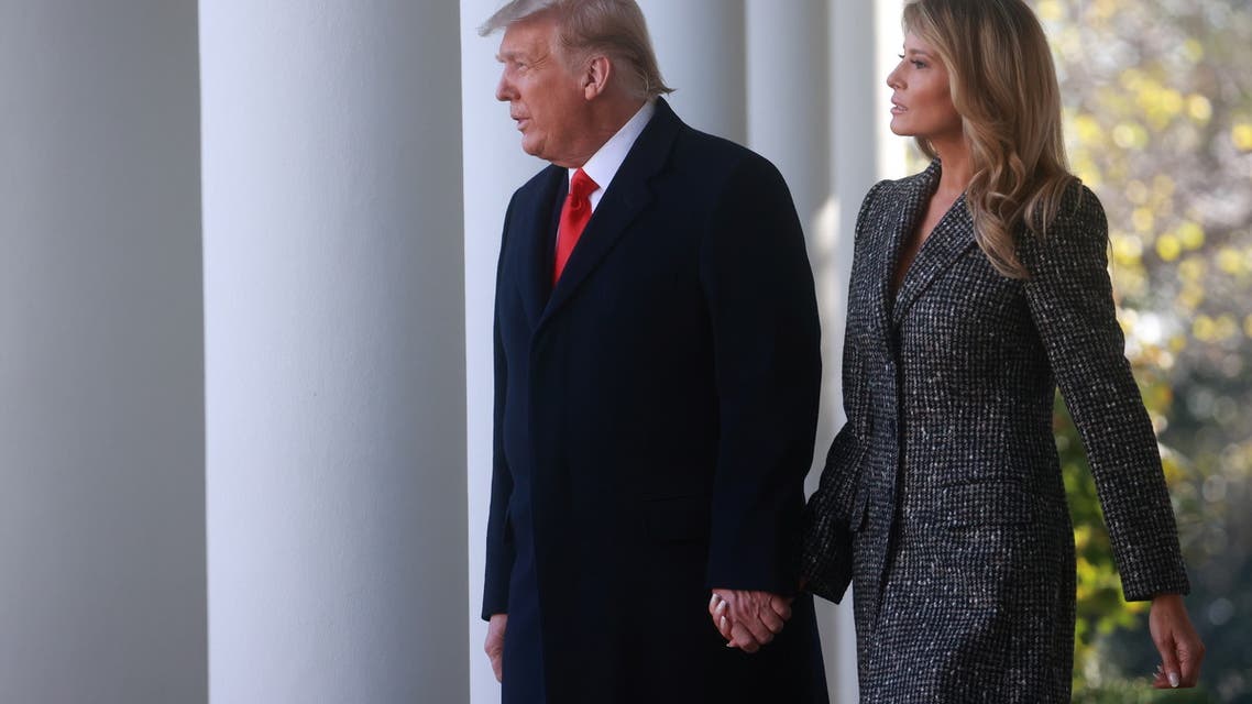 U.S. President Donald Trump and first lady Melania Trump arrive for the presentation (and pardoning) of the 73rd National Thanksgiving Turkey in the Rose Garden at the White House in Washington, U.S., November 24, 2020. REUTERS/Hannah McKay
