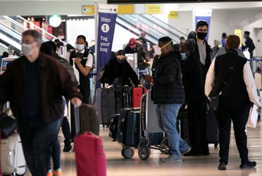 Travelers at Newark International Airport ahead of Thanksgiving holiday in Newark, New Jersey. (Reuters)