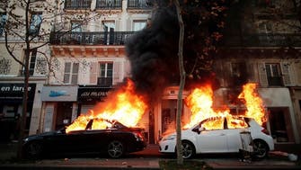 Security forces fire tear gas at Paris protest against police violence