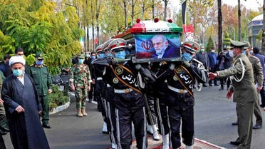 A handout picture provided by Iran’s Defesce Ministry on November 30, 2020 shows members of Iranian forces carrying the coffin of slain top nuclear scientist Mohsen Fakhrizadeh during his funeral ceremony in Iran’s capital Tehran. (AFP)