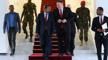 US Secretary of State Mike Pompeo, center right, walks with Ethiopia's PM Abiy Ahmed, center-left, in Addis Ababa, Feb. 18. 2020. (AP)  