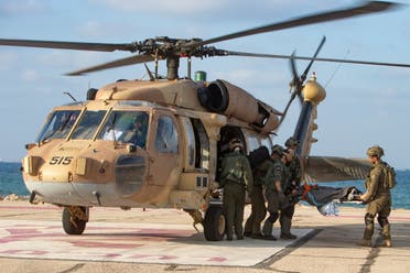 Israeli paramedics and soldiers evacuate a mock wounded comrade at a helipad in Ramban hospital in the Mediterranean city of Haifa on September 1, 2019 as part of a deception operation of the Israeli army in order to mislead the leadership of Lebanese Hezbollah. (File photo: AP)