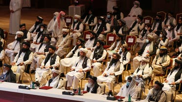 Members of the Taliban delegation attend the opening session of the peace talks between the Afghan government and the Taliban in the Qatari capital Doha on September 12, 2020. 