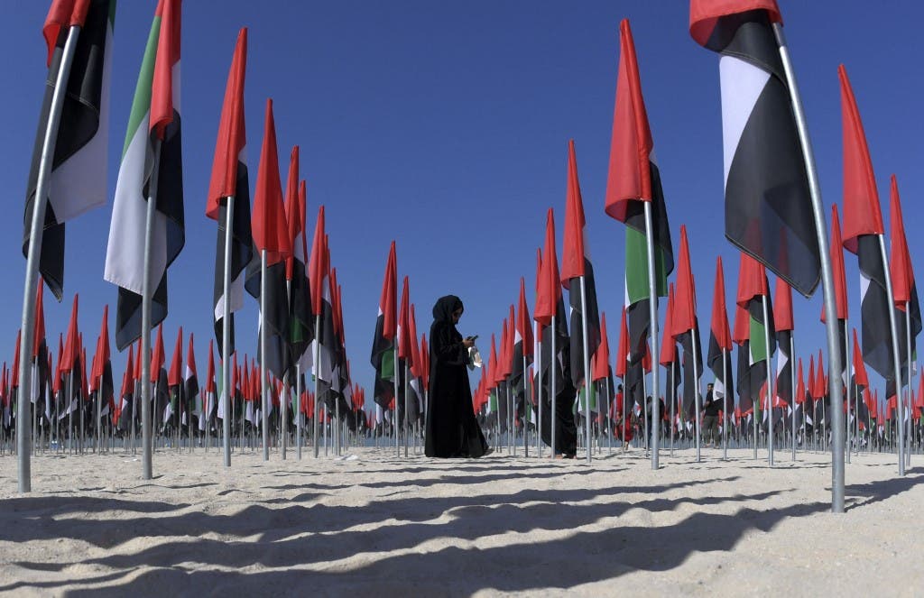Emiratis attend celebrations of UAE's national day on December 2, 2020. (Karim Sahib/AFP)