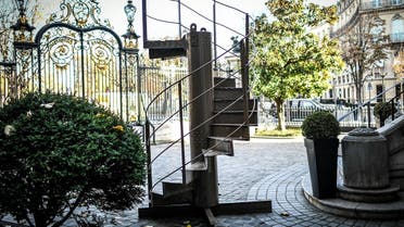 In this file photo taken on November 12, 2020 shows a section of the original Eiffel Tower’s stairs, displayed in front of the Artcurial auction house in Paris. (Stephane De Sakutin/AFP)