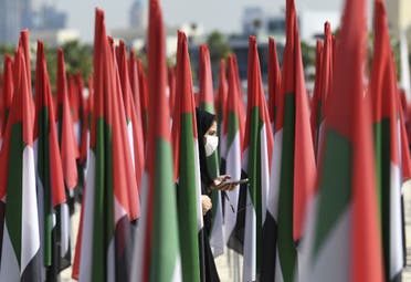 Emiratis attend celebrations of UAE's national day on December 2, 2020. (Karim Sahib/AFP)