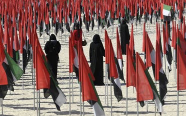 Emiratis attend celebrations of UAE's national day on December 2, 2020. (Karim Sahib/AFP)