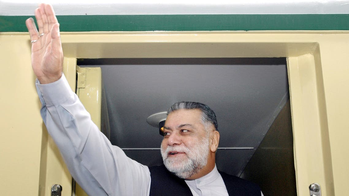 Mir Zafarullah Khan Jamali waves to supporters in 2004. (File photo, AFP)