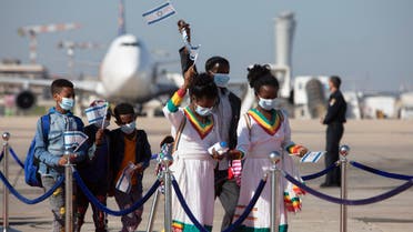 Ethiopian immigrants arrive at the Ben Gurion airport on Dec. 3, 2020. (AP)