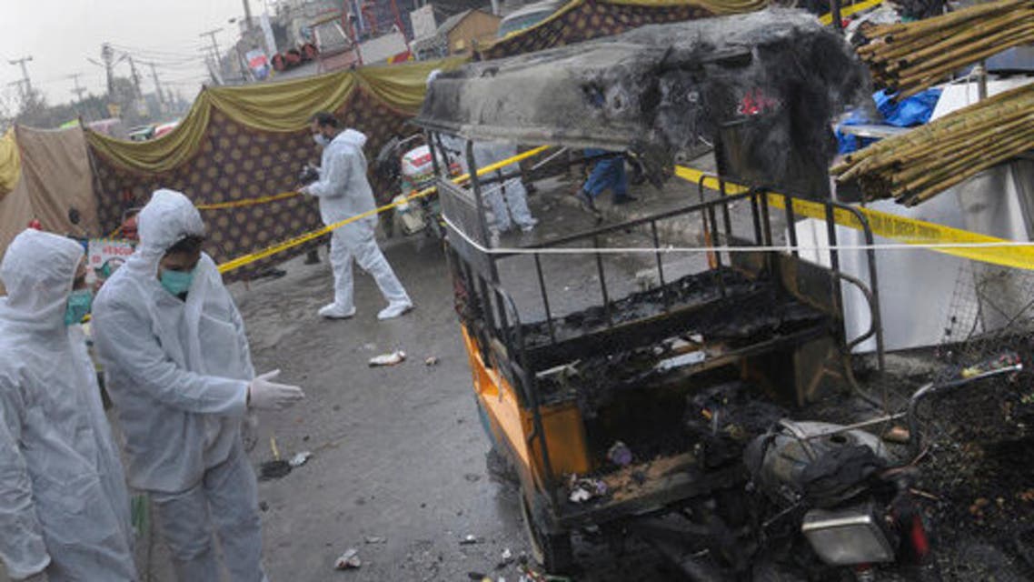 Pakistani investigators examine the site of bomb explosion in Rawalpindi, Pakistan on Friday, December 4, 2020. (The Associated Press/A.H. Chaudary)