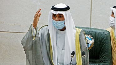 Emir of Kuwait Sheikh Nawaf al-Ahmad al-Jaber al-Sabah gestures during a parliament session. (AFP)