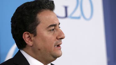 FILE PHOTO: Turkey's Deputy Prime Minister for the Economy Ali Babacan answers a question at a news conference during the IMF spring meetings in Washington April 17, 2015. REUTERS/Gary Cameron/File Photo